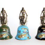 ceramic bells with hercule statue